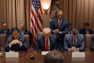 The Pastor Scott Turner, secretary for housing and urban development, offered prayer at the beginning of the meeting